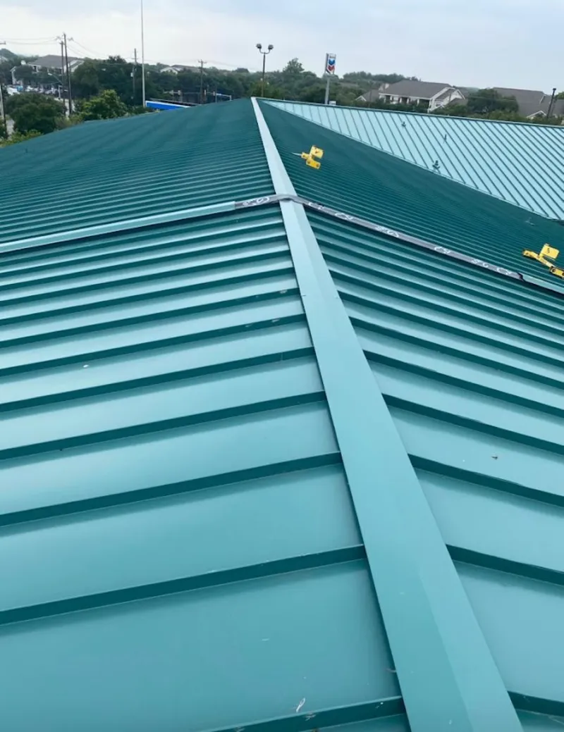 Green commercial metal roof ridge and valley for Metal Roof Repair in Belvedere